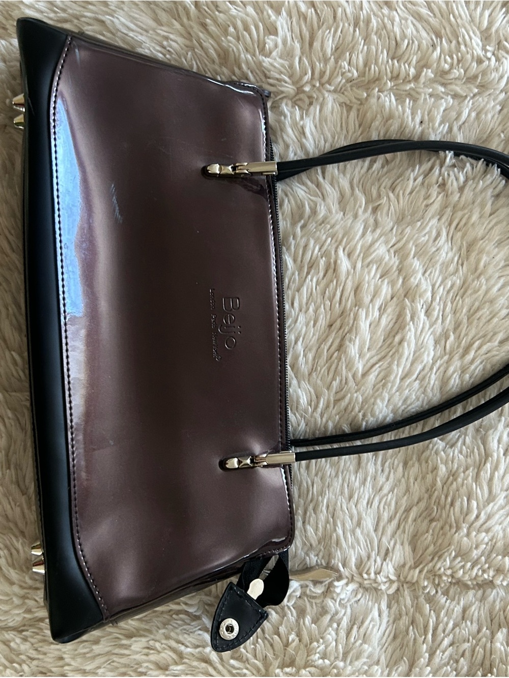 Beijo Patent Shoulder Bag in Plum and Black with Gold Accents
